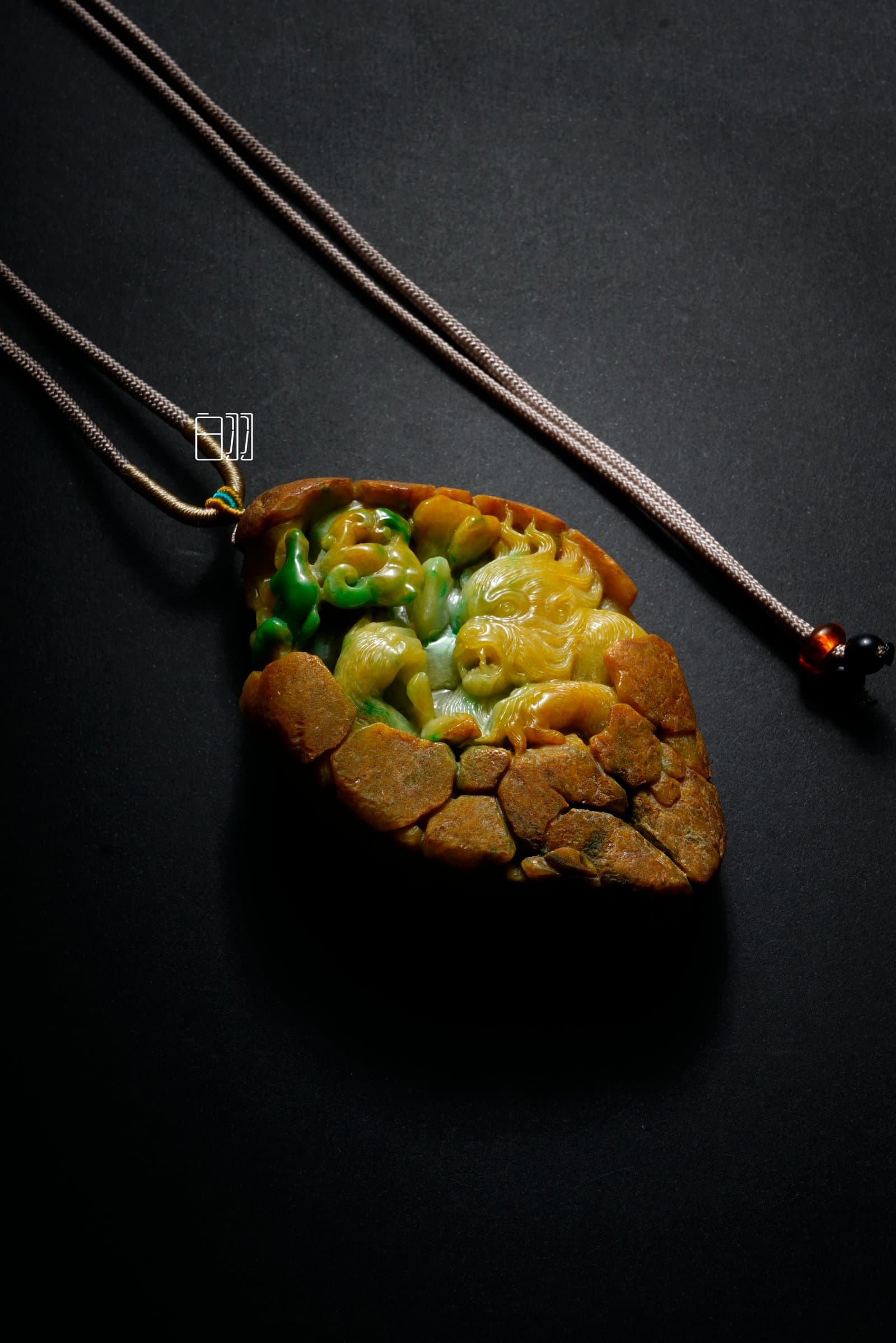 Yellow & Green Jadeite Mountain Spirit Pendant in natural light