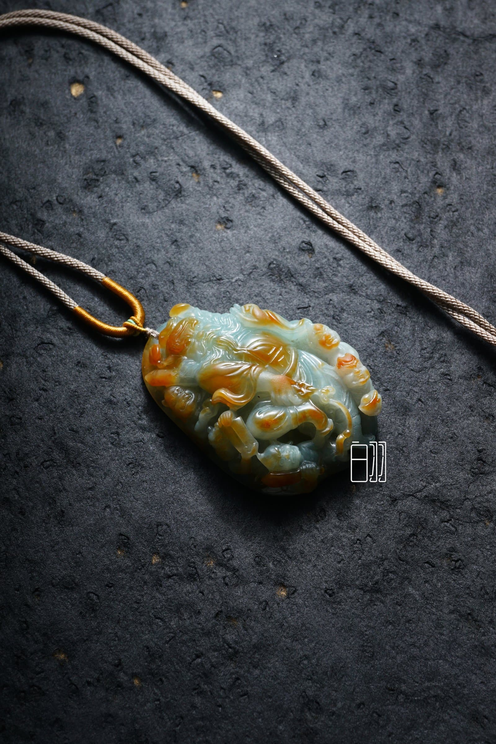 Multi-Color Deity Jadeite Pendant in natural light