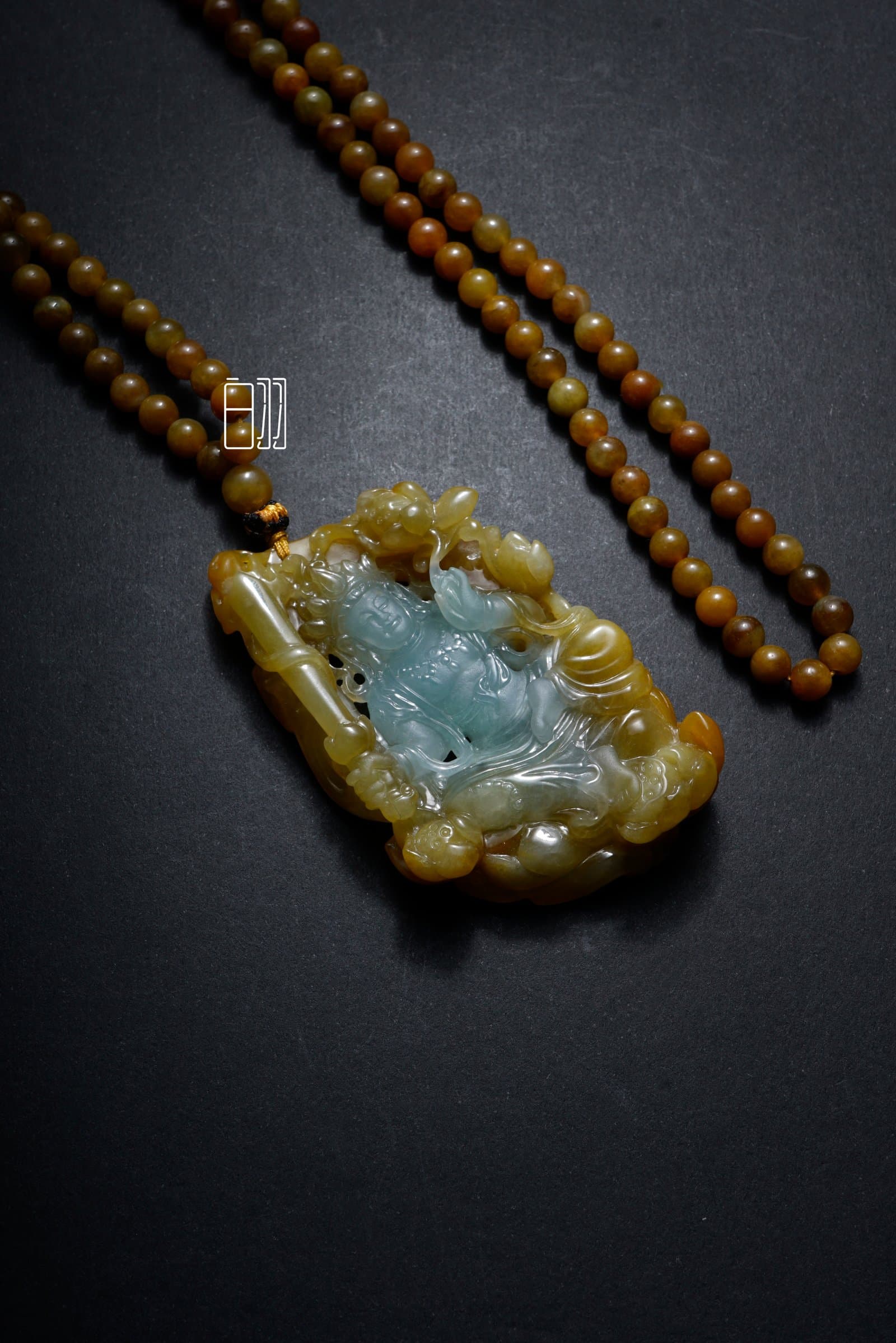 Yellow Jadeite Deity Pendant — Auspicious Aura in natural light