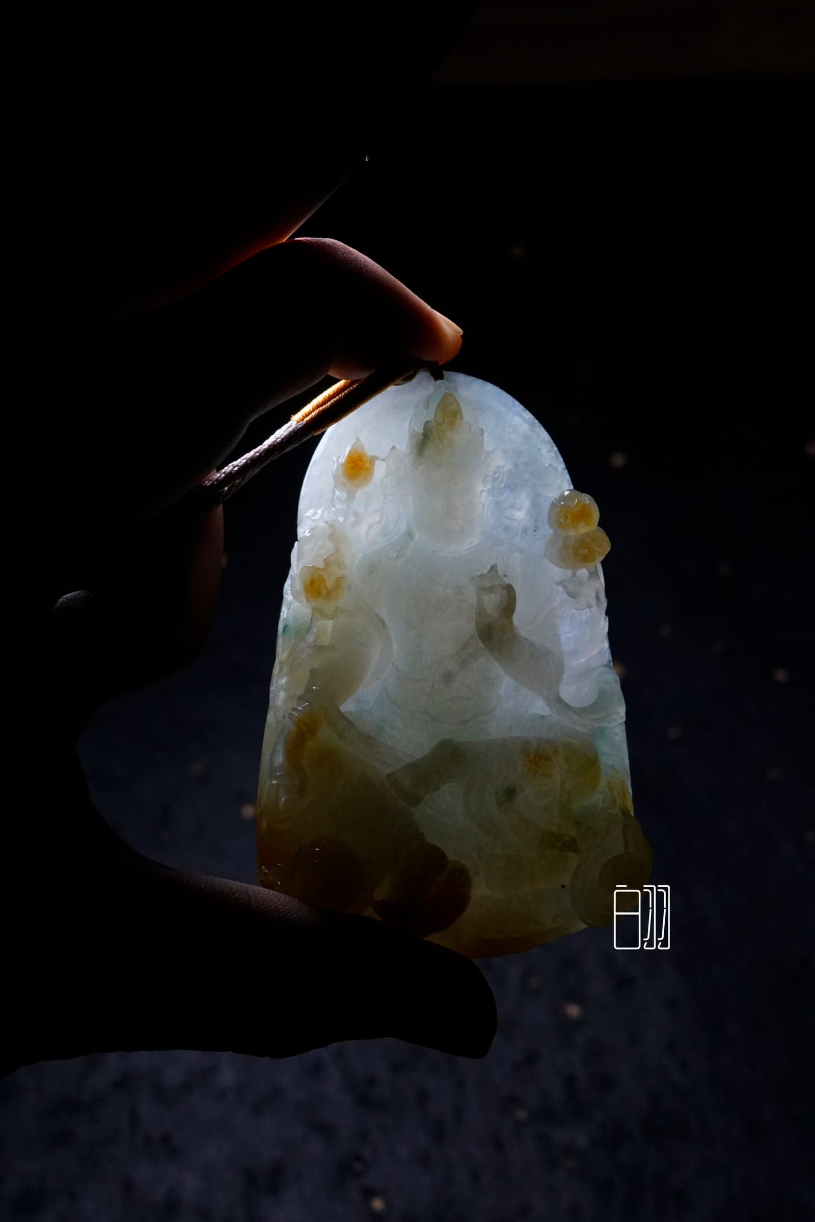Yellow Jadeite Sacred Image Pendant in natural light
