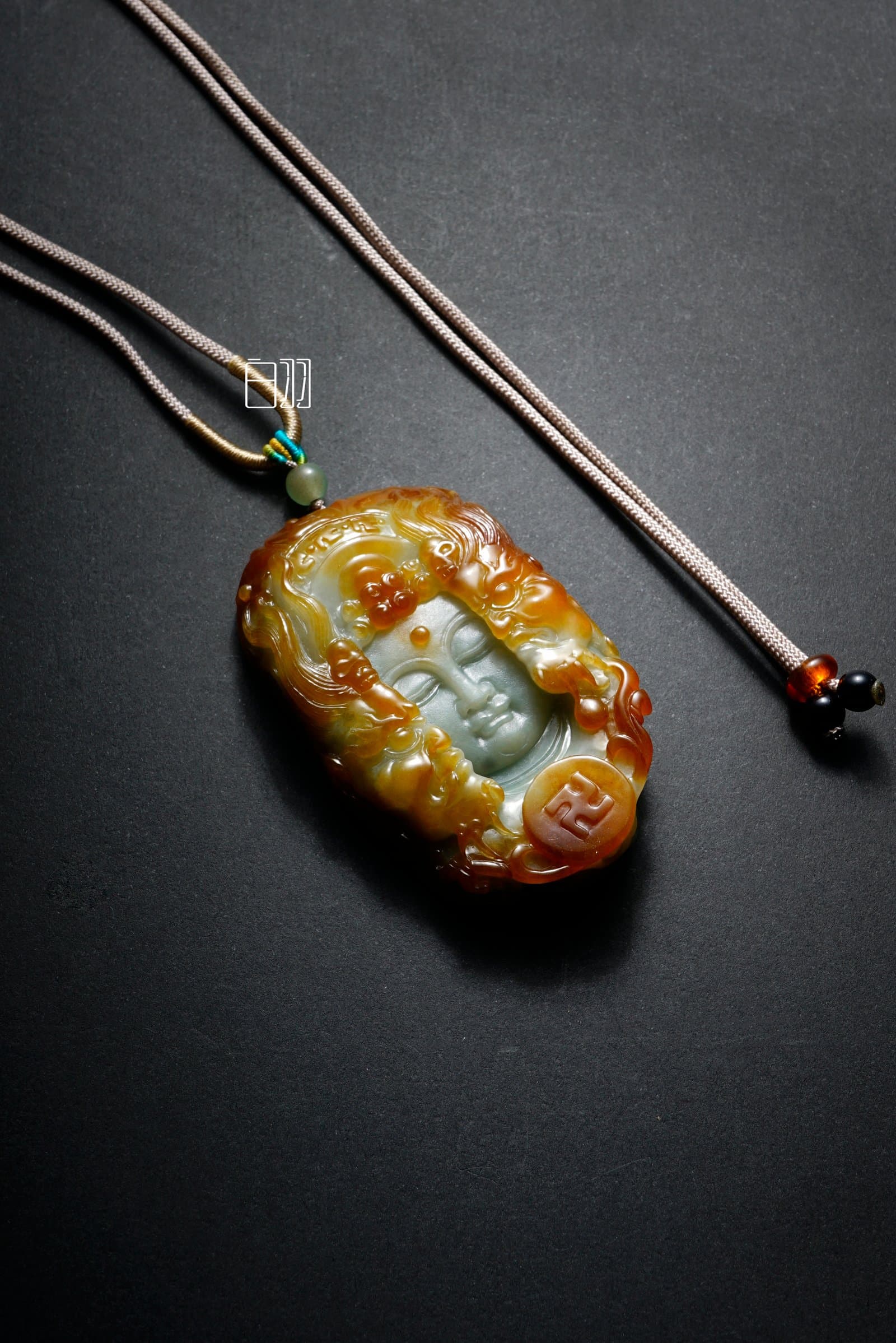 Yellow Jadeite Sacred Countenance Pendant in natural light