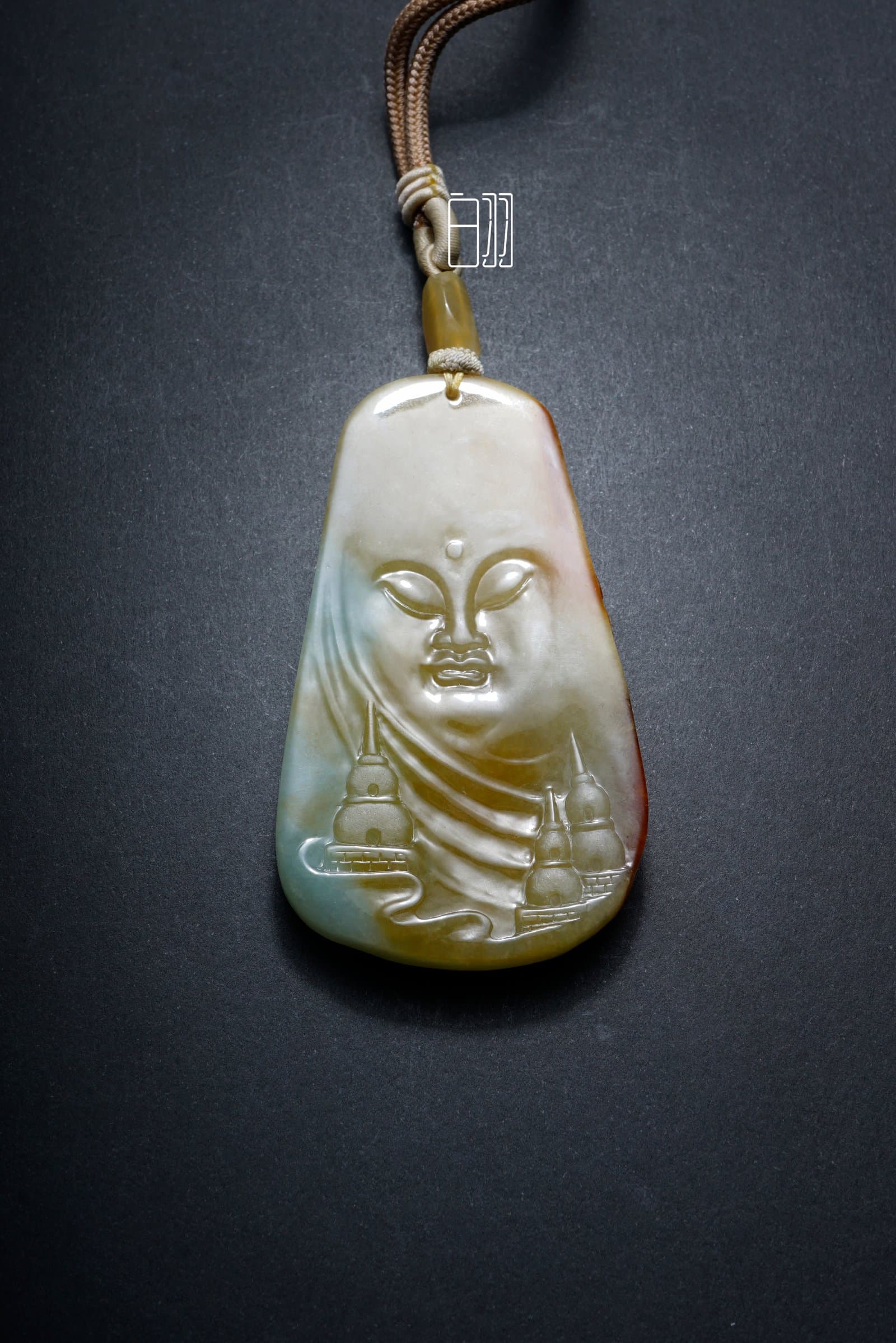 Two-Tone Buddha Realm Jadeite Pendant in natural light