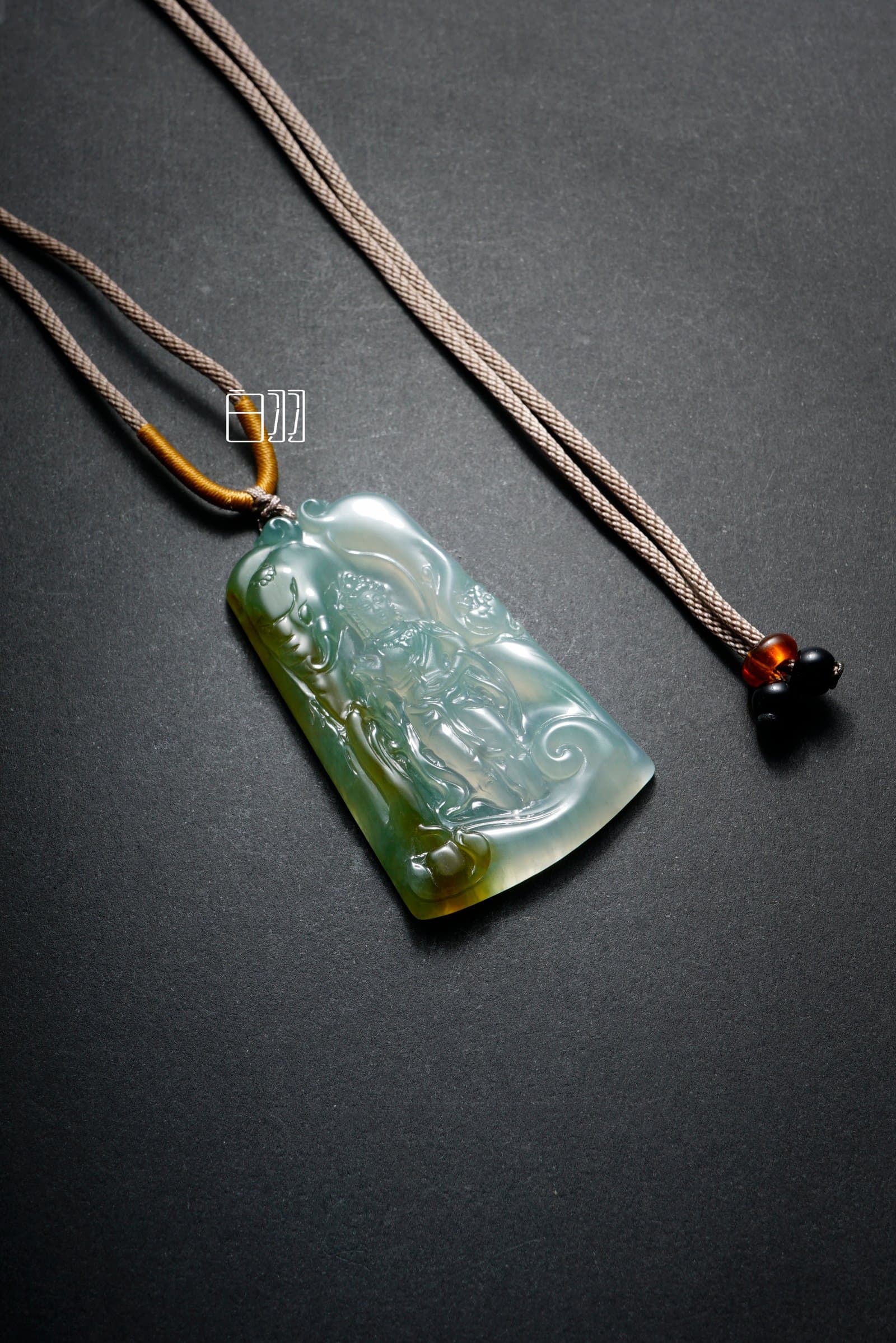 Clear Water Icy Guanyin Crossing the Sea Pendant in natural light